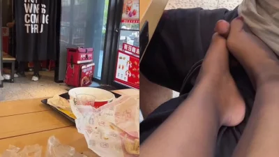冰妈带男奴吃炸鸡都不安分肯德基店员还在旁边就露出鸡巴足交
